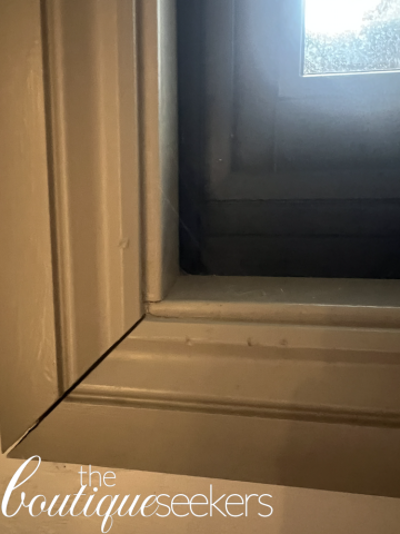 Image of cobwebs in kitchen window
